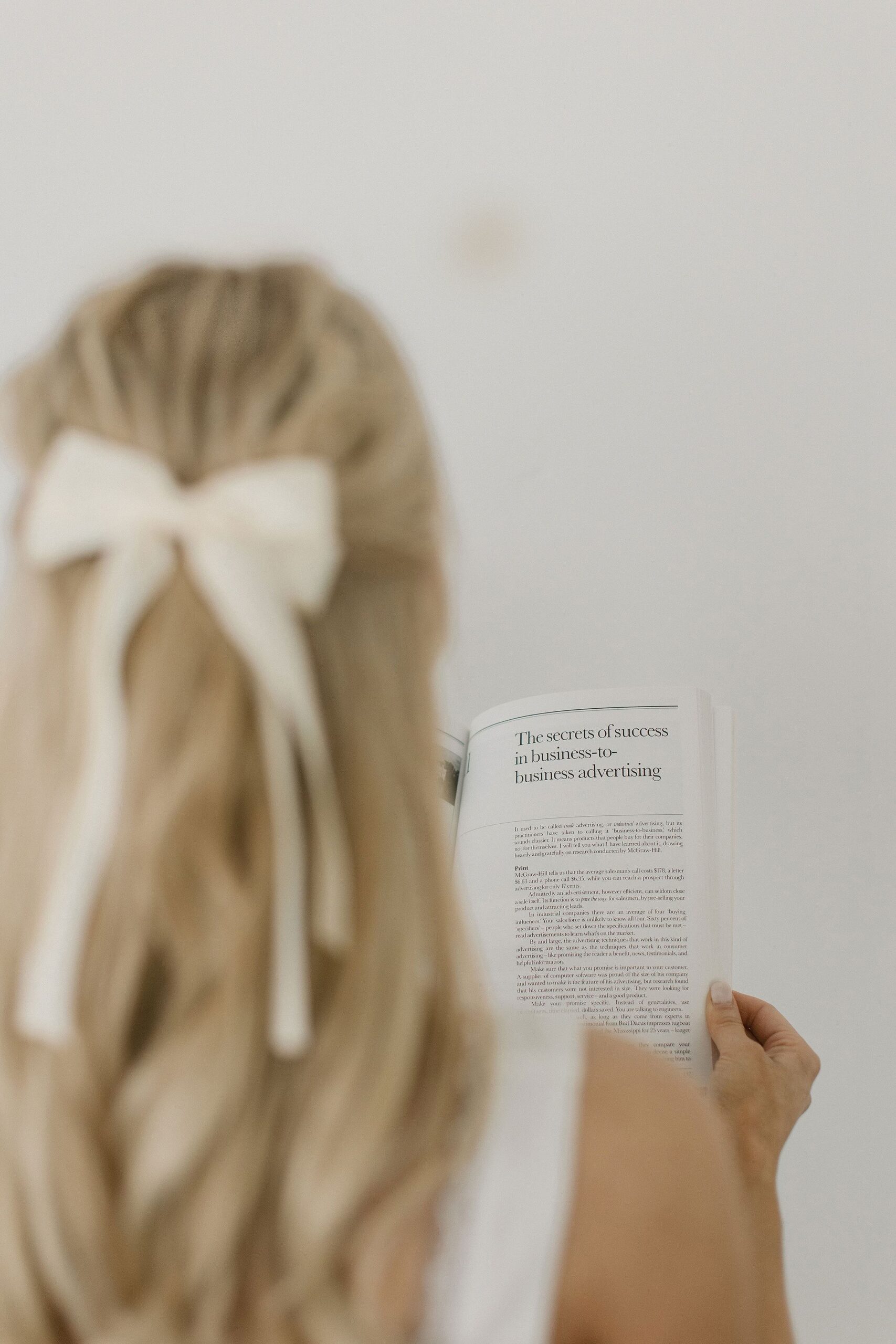 A woman reading a book.